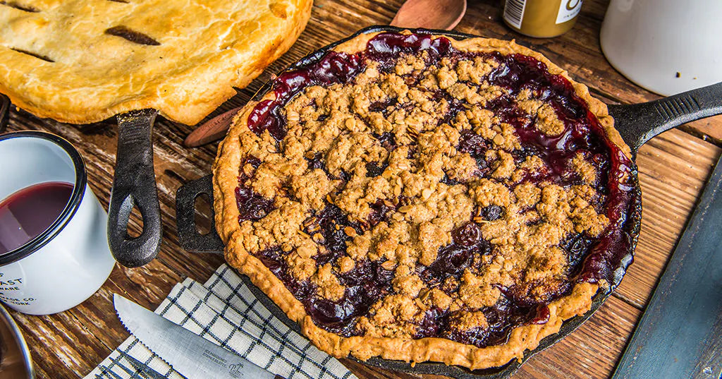 Cherry Bourbon Pie on a wood cutting board